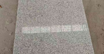 嘉峪关芝麻白光面毛板