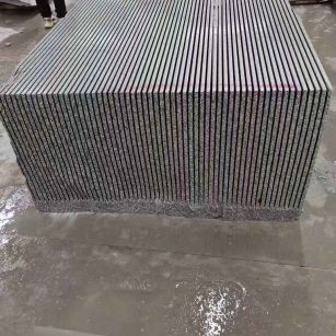 嘉峪关芝麻白毛板荒料切割