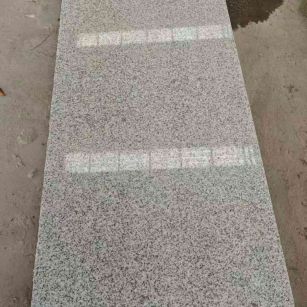 嘉峪关芝麻白光面毛板